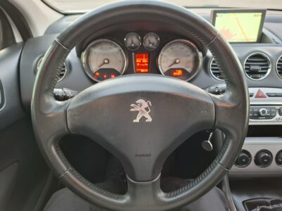 1402990340-Peugeot 308 completo
