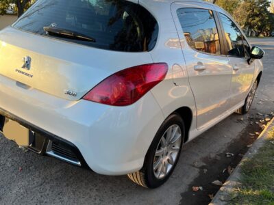 1402990340-Peugeot 308 completo