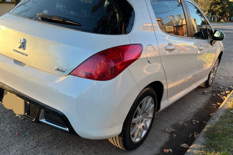 1402990340-Peugeot 308 completo